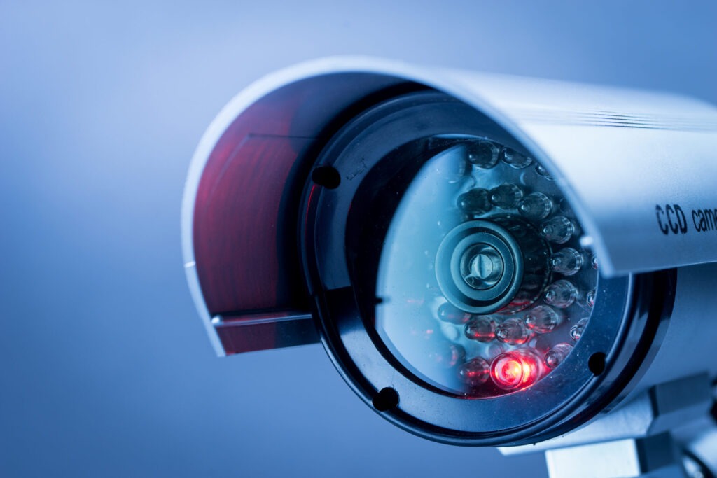 Technician installing CCTV camera surveillance system in Darlington | MBAC Air Conditioning And Facilities Service
